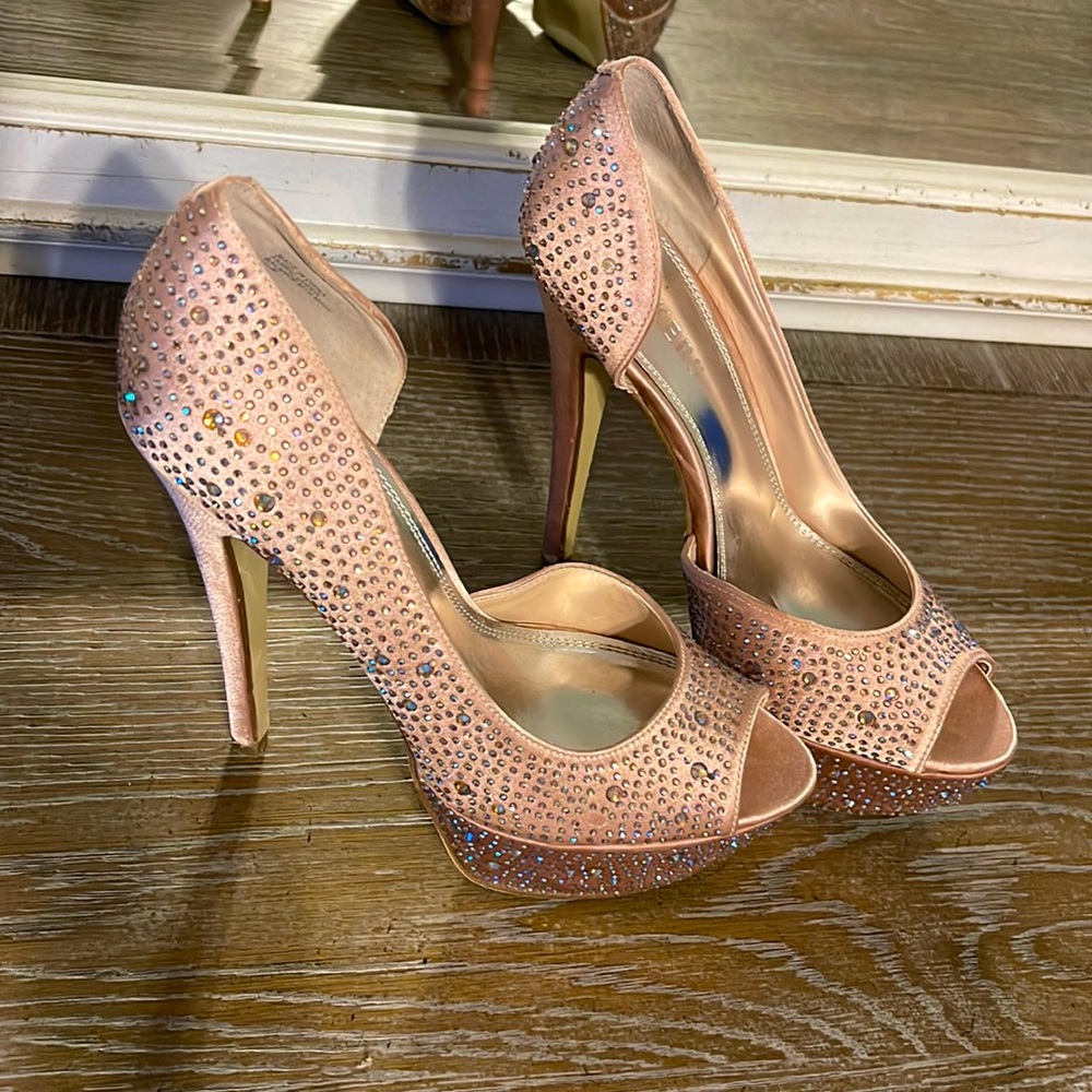 Bakers heels. Very sparkly. New condition. Size 7.5 womens.